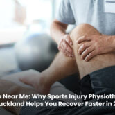 Physiotherapist treating a patient with a sports injury at a physiotherapy clinic in Auckland.
