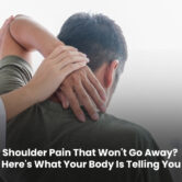 Shoulder Pain That Won't Go Away? Causes & Relief Tips Person experiencing persistent shoulder pain while holding their shoulder, highlighting discomfort and the need for physiotherapy assessment and treatment.