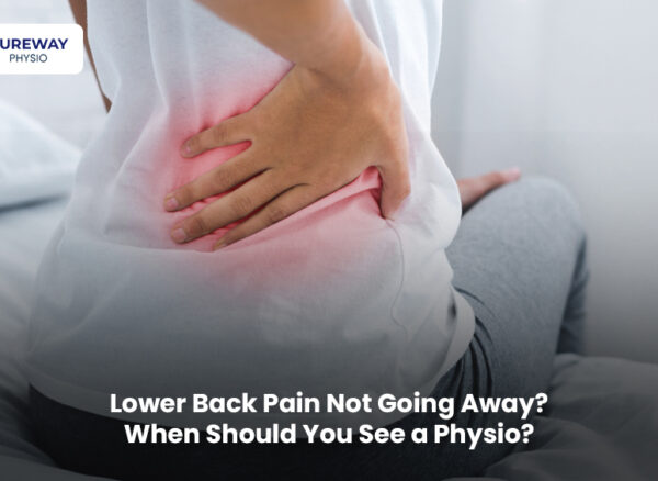 Physiotherapist helping a patient with persistent lower back pain