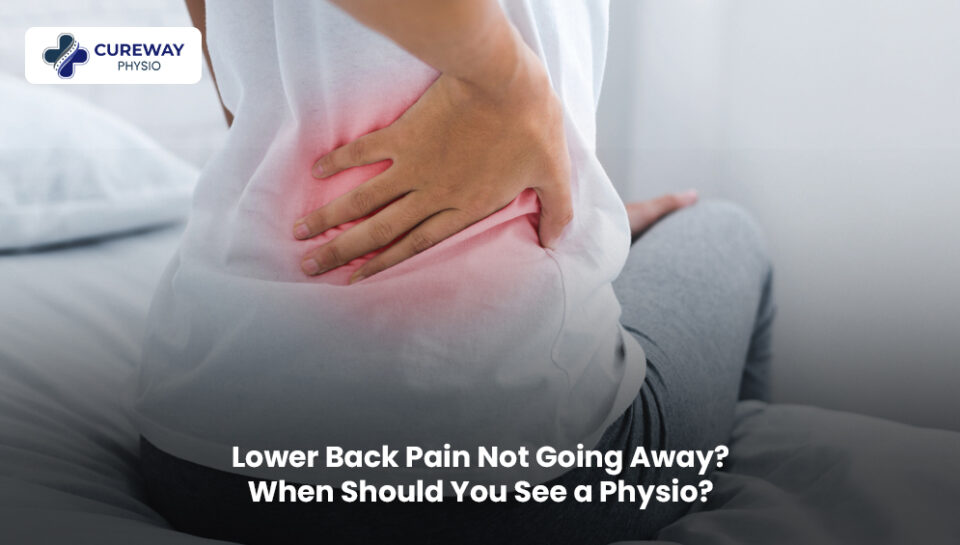 Physiotherapist helping a patient with persistent lower back pain