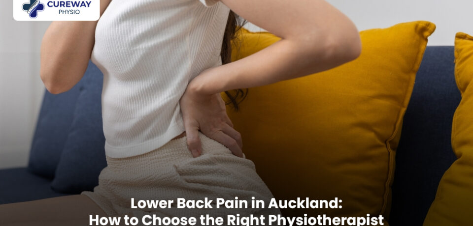 Physiotherapist helping a patient with lower back pain in Auckland